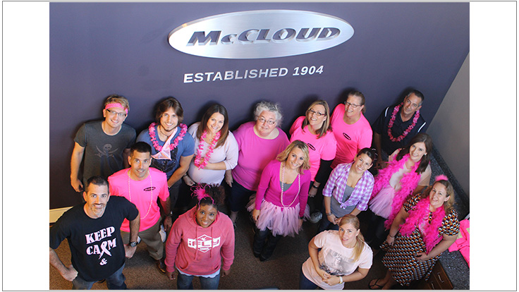 McCloud Services Wears Pink Gloves for Breast Cancer Awareness