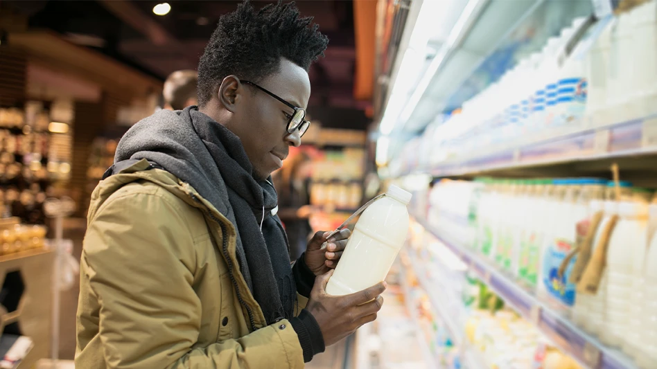 shopper checking a product label